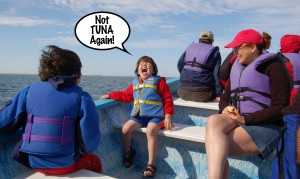 Boy screaming not tuna again in boat